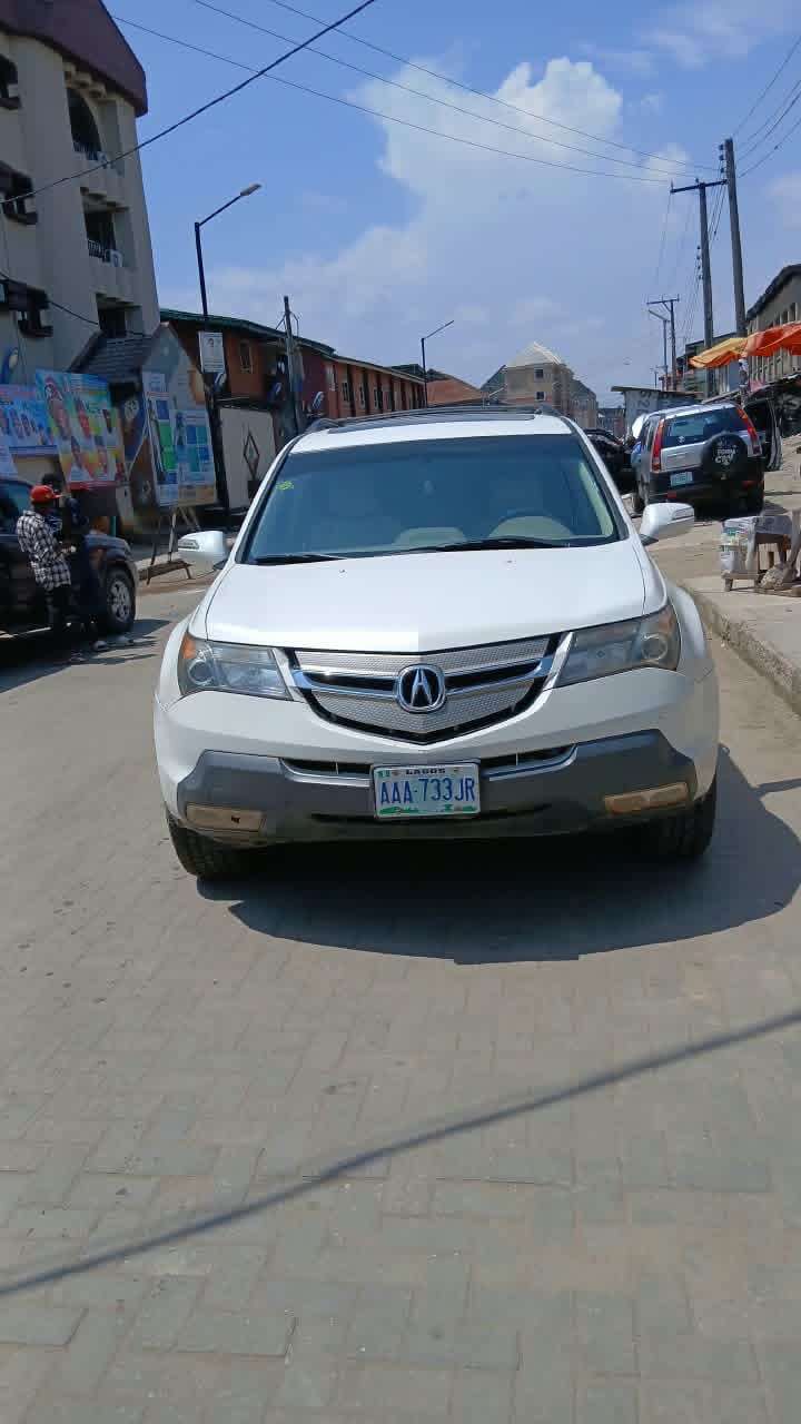 Awoof wey dey burst brain... 💯 Percent first body 08 Acura MDX neatly naija used... Engine, gear,AC in excellent condition...  4.950... slightly Negotiable  Arepo, off Berger axis, Lagos